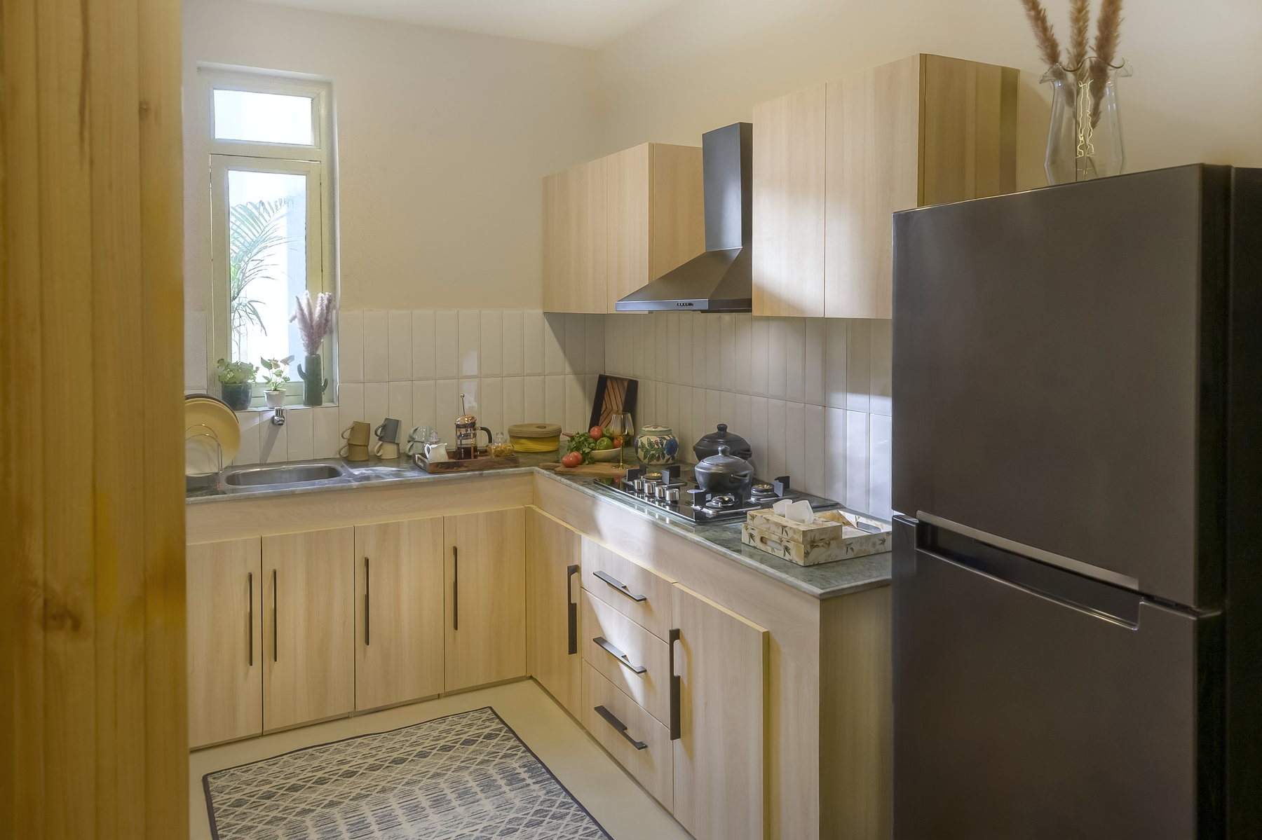 Furnished fitted kitchen at Smart Homes Karnal.