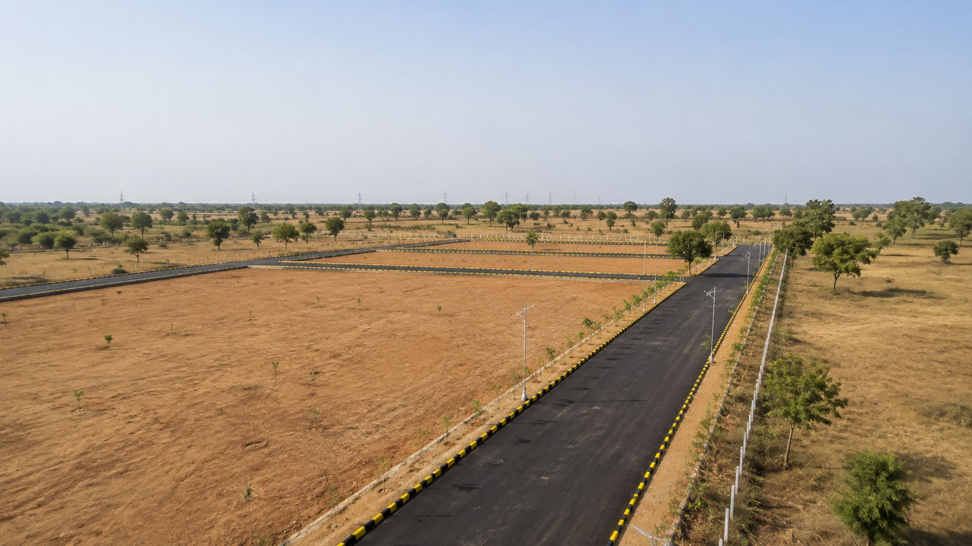 Internal roads and plotted land at Pratham, Dholera.